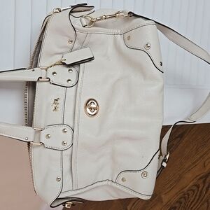 Chic White Coach Handbag with Gold Accents